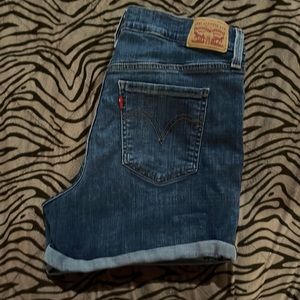 Levi’s mid length shorts size 32.